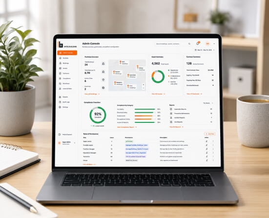 Admin console open on a laptop, showing portfolio overview and compliance reporting